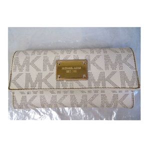 Michael Kors, vanilla, and cream, treated canvas Gold hardware 7.75”x4.”…